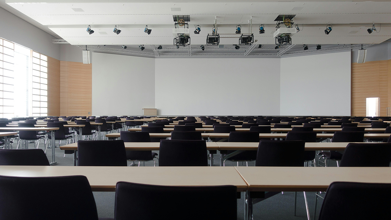 An image of a classroom, similar to the ones you would be studying in for RECO if you wanted to become a Toronto real estate broker.