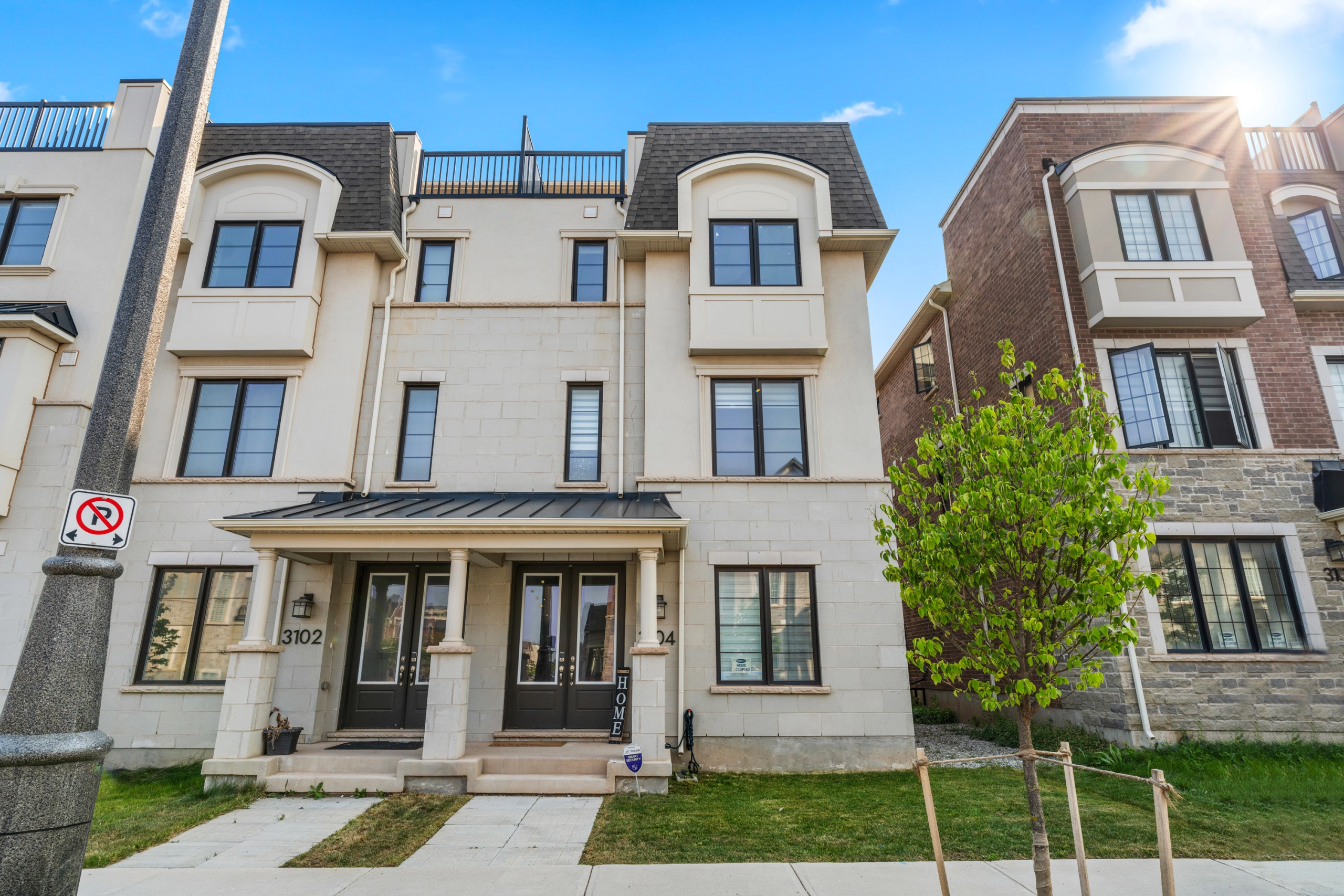 An image of the exterior of 3104 William Cutmore Boulevard, a freehold townhome in Oakville currently offered for lease by Toronto real estate broker Marco Pedri, broker with Shoreline Realty Corp., Brokerage.